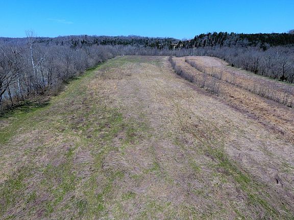 Large tillable field along the northern boundary separating the rivers