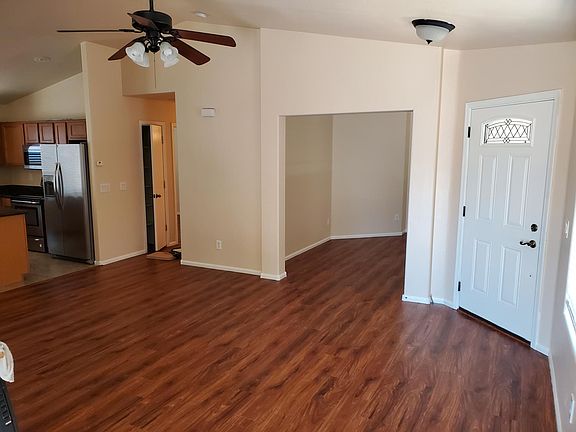 View from Patio Door towards kitchen. Showing "den" or "office" area.