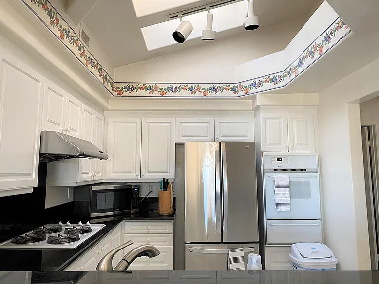 Fully equipped kitchen with skylight