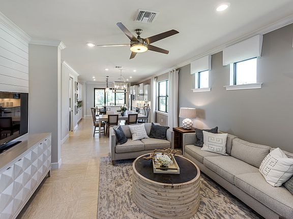 Model Representation Connected living spaces with flow-through layout porcelain tile floors