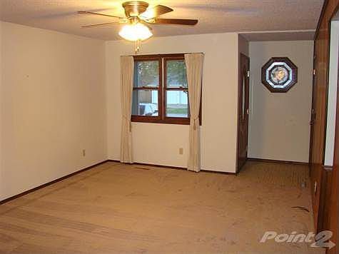 Living room- notice the new carpeting throughout living room, bedrooms and hallway