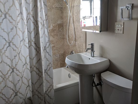 New, shiny w/ soaking tub!