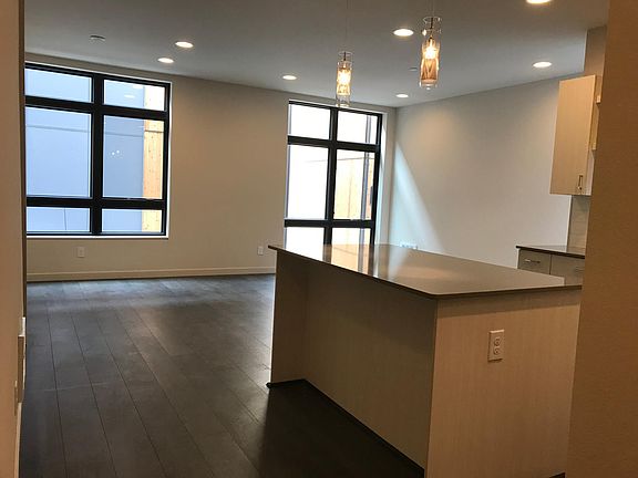 Living area with floor to ceiling windows