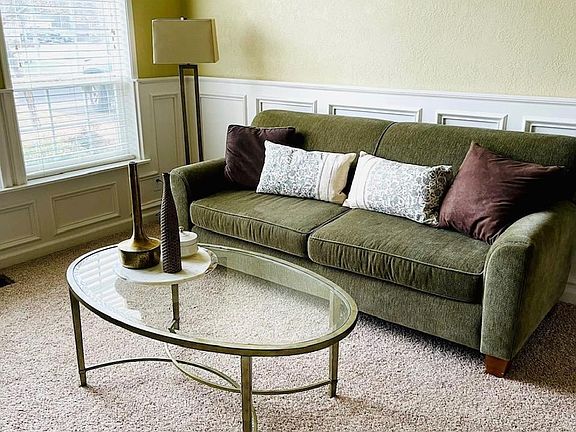 Formal living w/ vaulted ceiling