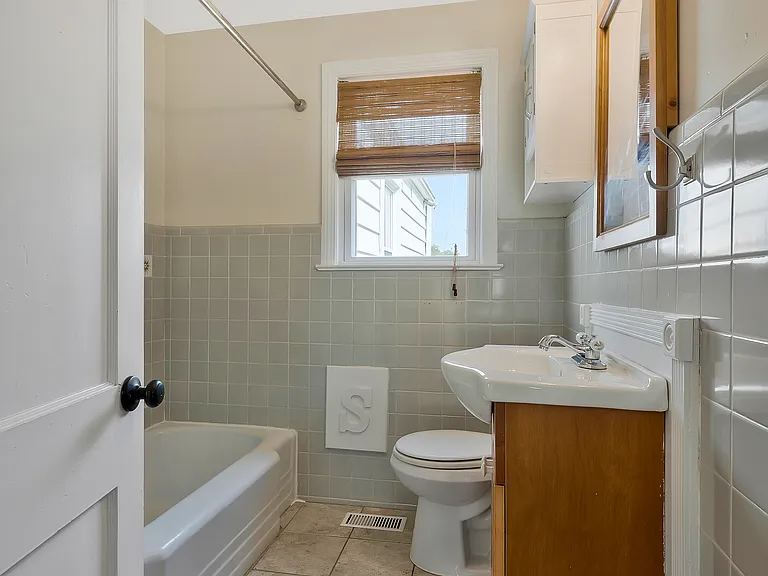 Photo 16. Full bath with tub and shower