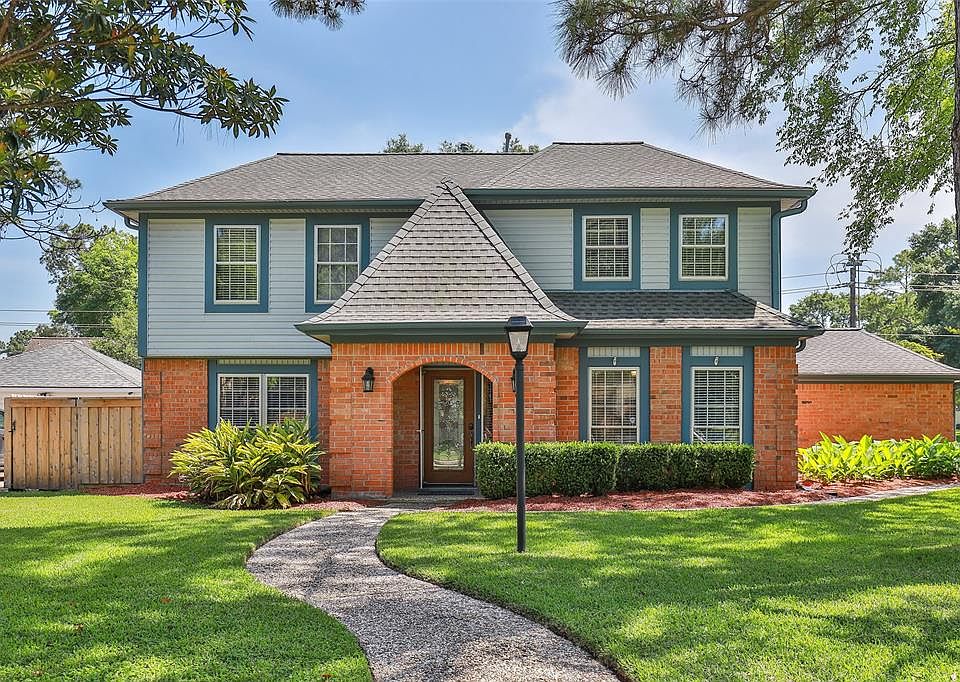 Welcome to this beautiful 2-story home on a substantial corner lot with detached side-entry garage!