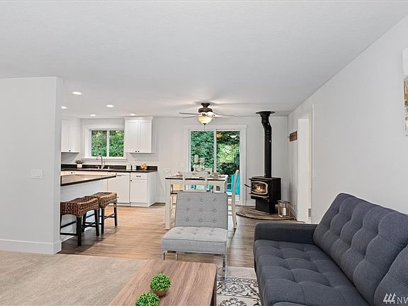 Living room is open to dining and kitchen area.