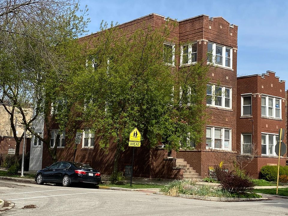 Exterior view. Look at all those windows! It is a Lovely quiet street with a landscaped garden