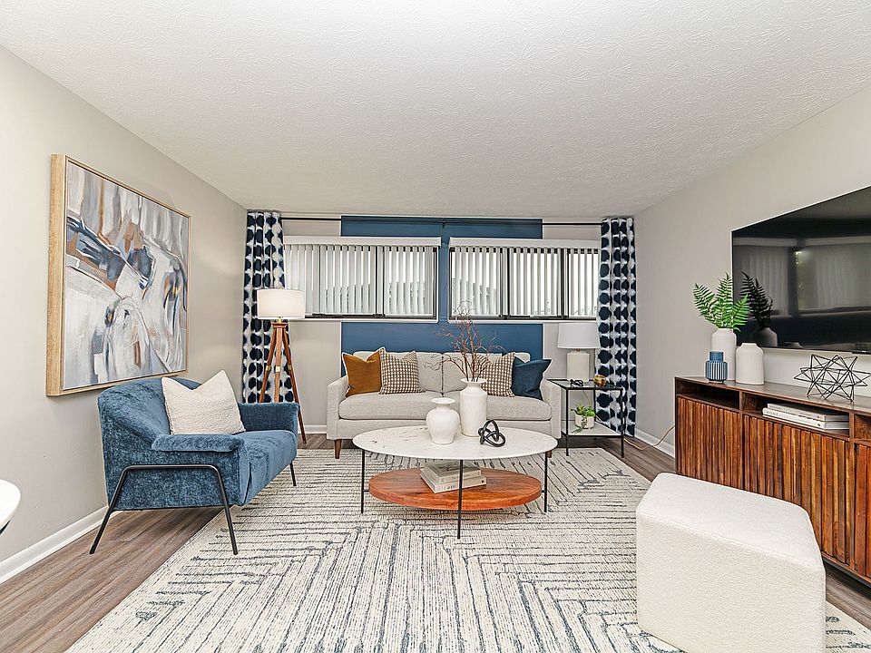 Spacious living room with hardwood-style flooring