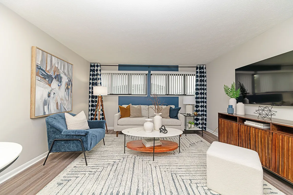 Spacious living room with hardwood-style flooring