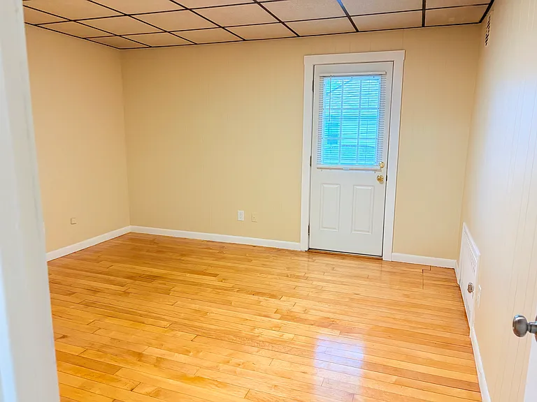 Bedroom #1 with door to porch