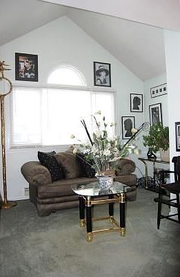 One bedroom is being used as a quiet sitting room