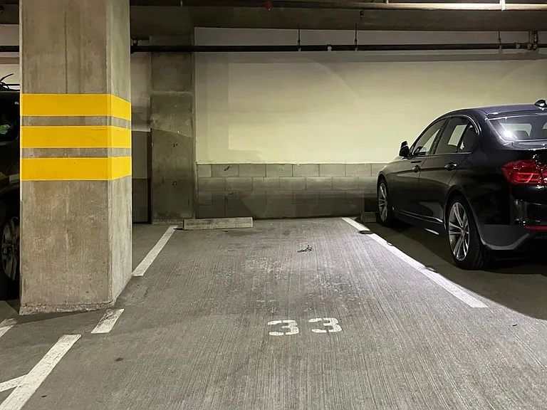 Dedicated garage parking space available separately.