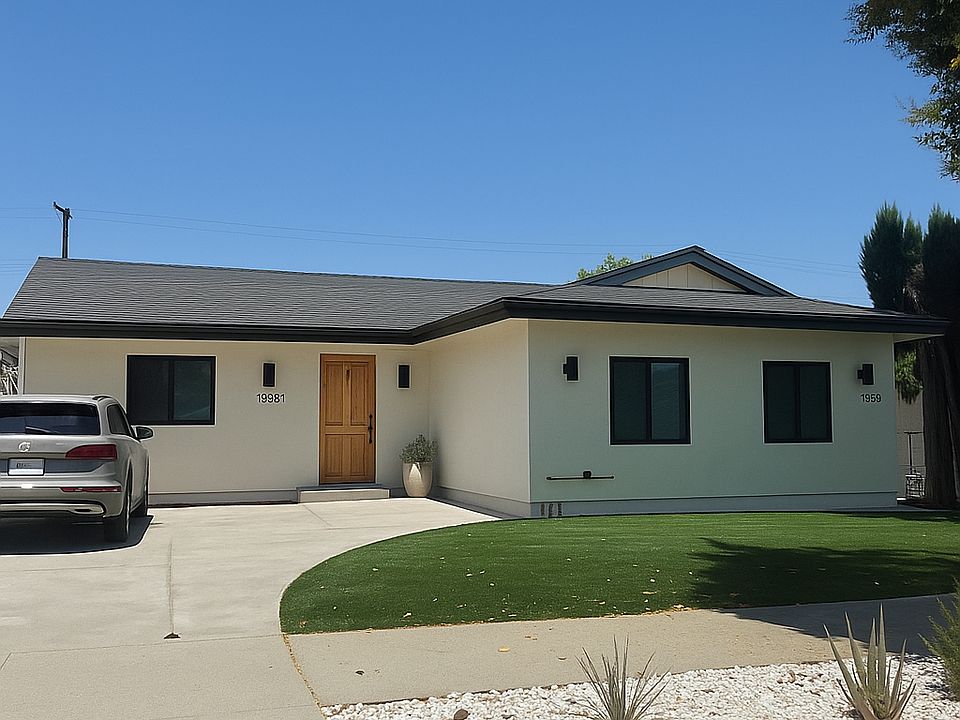 This image reflects an impression of what the front of the home will look like, since it's currently being renovated and will be brand new!