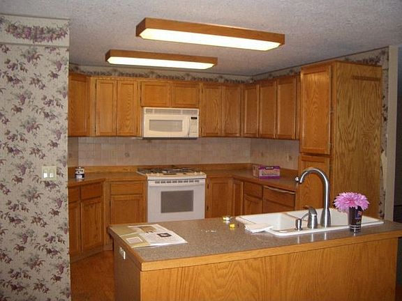 kitchen has island and eating area