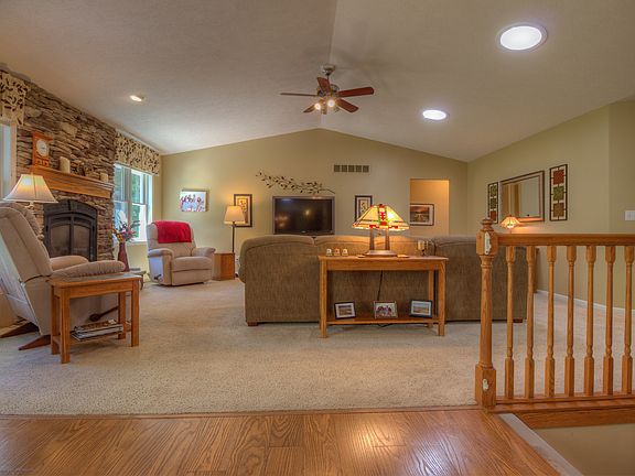 Living Room w/ Vaulted Ceilg