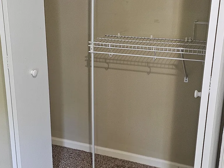 The first bedrooms one of two walk-in closets
