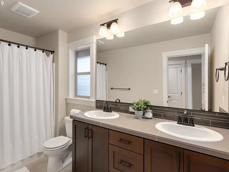7023 NW Eleanor Ave — Photo 14