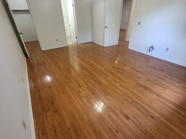 Master bedroom at the end of the hallway