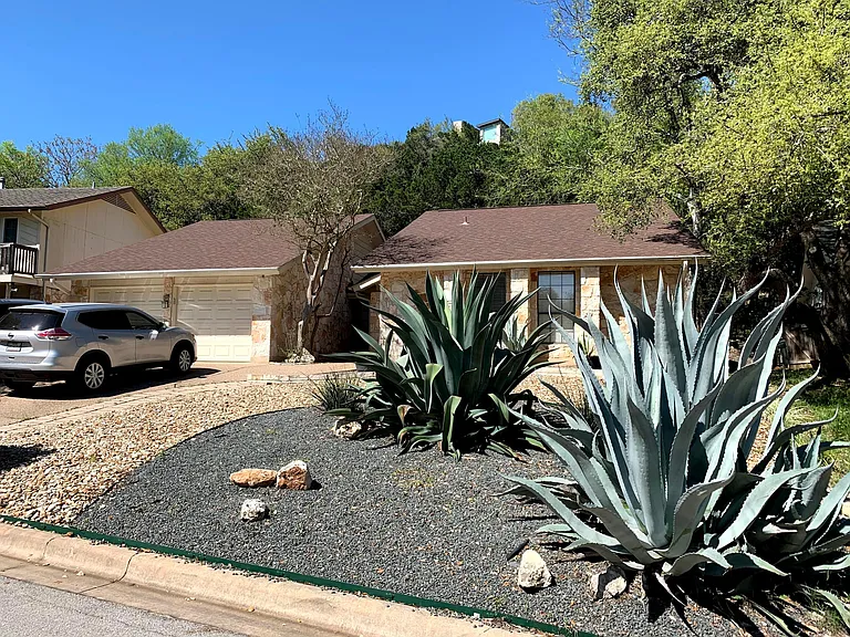 view of the house from Turtle Point Dr.