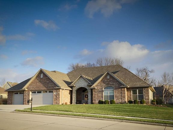 Arched window matches entry.
