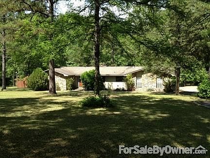 Large, gentle sloping, front yard
						:
						House faces south; cedar & rock