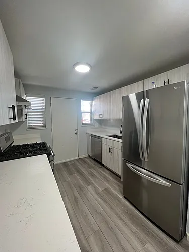 Beautifully Renovated 2 bedroom in Aurora! Right on the park and close to Stanley Marketplace! Photo 1