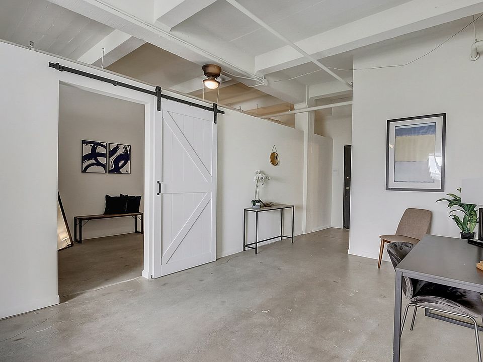 Loft interior with sliding bedroom doors