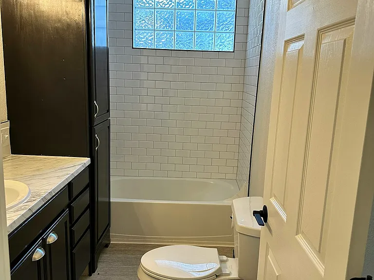 Bathroom Tub & Towel Closet
