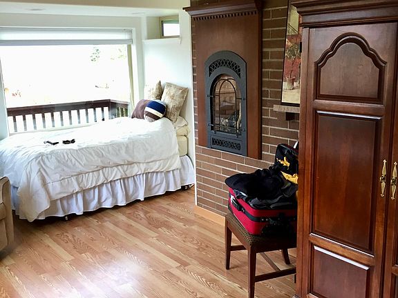 2nd bedroom with fireplace and deck access