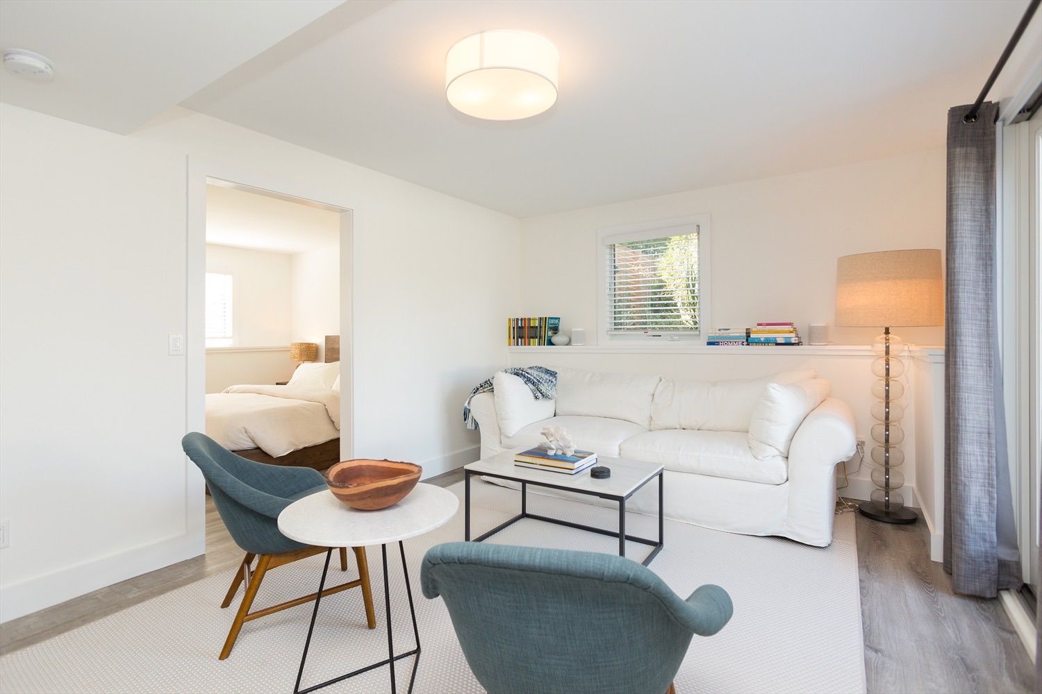  Downstairs living area has a private bedroom (king) with desk and Peloton (not pictured).