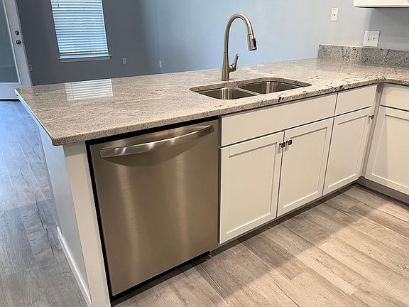 New Stainless Steel Dishwasher . . .