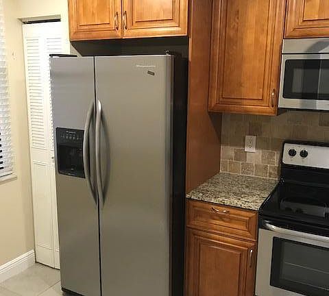 3rd image of 1230 S Military Trl APT 2015