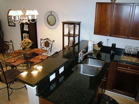 Spacious kitchen with bar