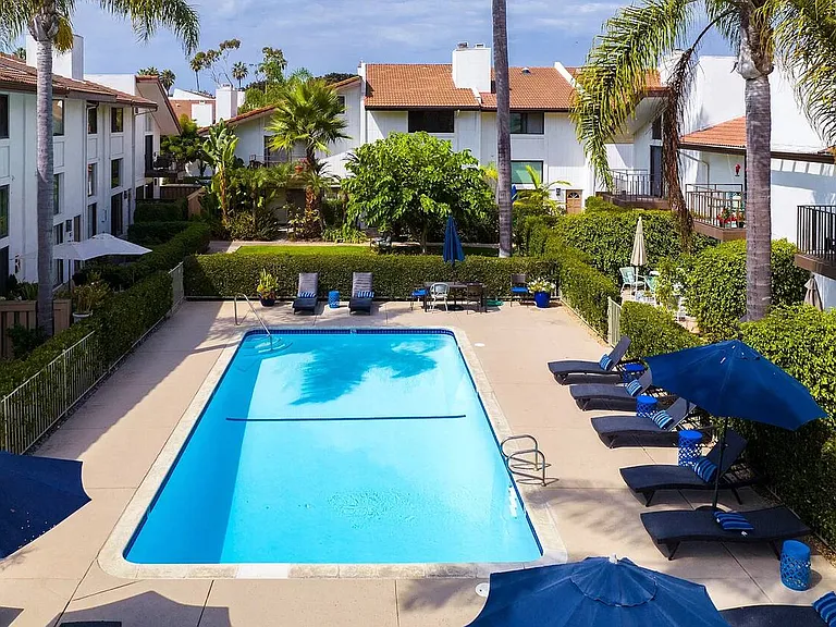 community pool steps from the townhome