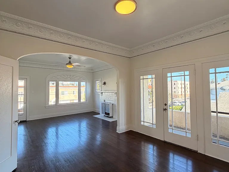there is a second private balcony off of the living room