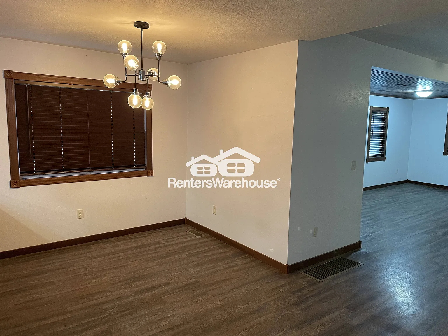 Updated 3BR Downtown Amery Main-floor Unit | Lake View, In-Unit Laundry, Balcony + 2 Parking Spaces — Photo 4