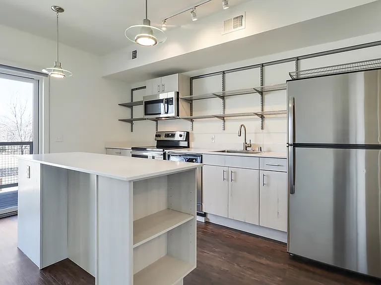 205 Kitchen pictured, 203 has same "Rio Grande" layout, finishes & features