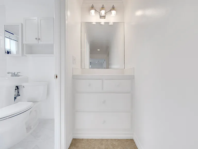 Dressing area next to bathroom