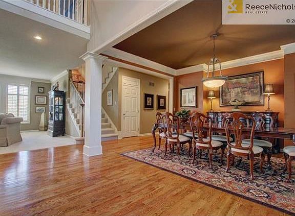 Gleaming hardwoods, plantation shutters & split stair case