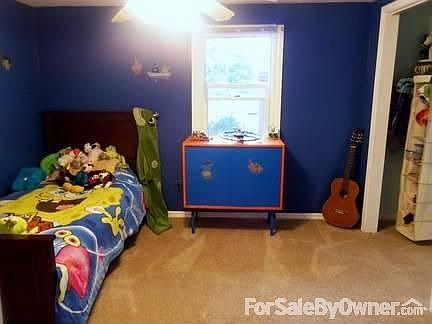 Dining and Living Room with Fireplace
						:
						Great open concept. Perfect for friends over.