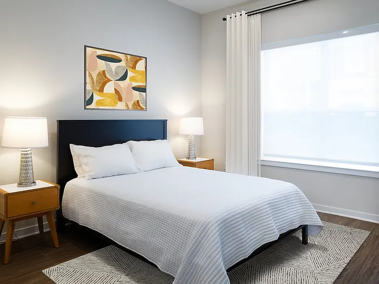 Upgrade Collection Bedroom with hard-surface vinyl plank flooring