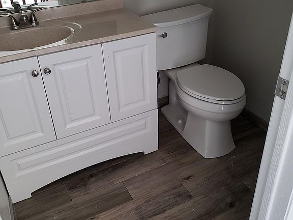 new bath rooms - all have same vanity and toilet