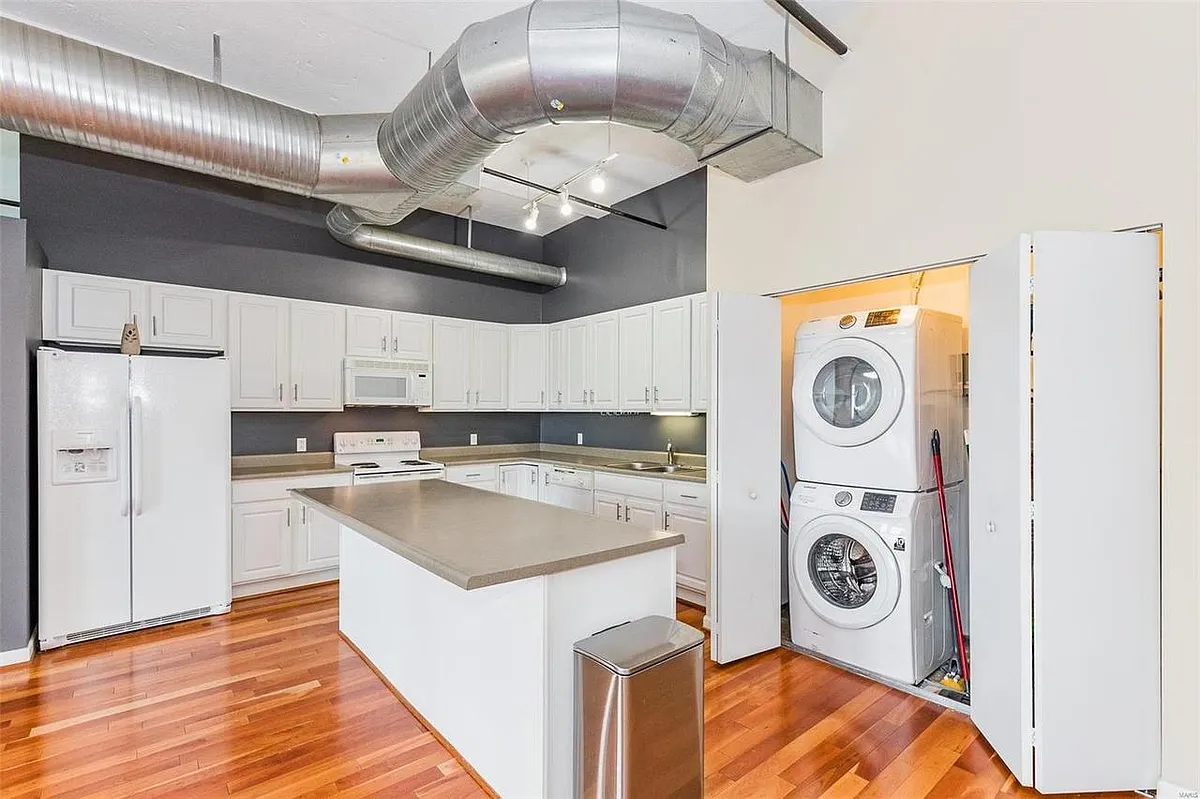 kitchen with laundry - 1501 Locust St #708