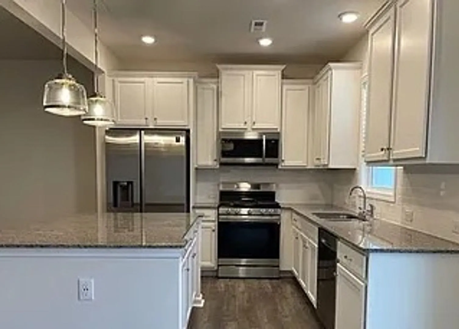 3 BR/2BA | 1-Car Garage | End-Unit — Photo 1