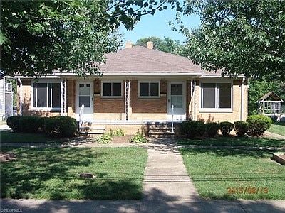 Front of duplex, right side is 855 Douglas