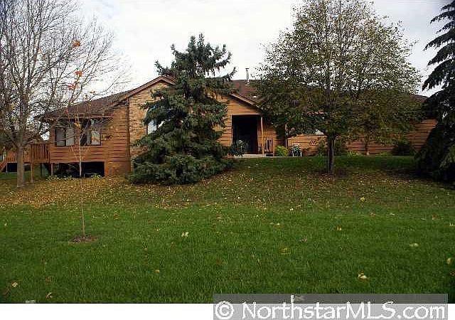 Simply great end unit townhome nestled within the trees