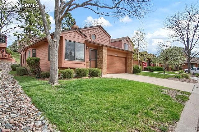 End unit ranch is light and bright with skylights