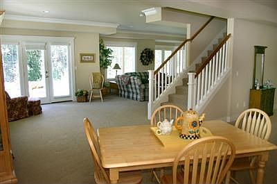 Daylight basement with theater room, workout room, game area and guest bedroom