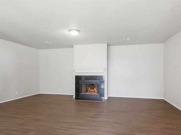 5th image of 6619 S Utica Pl